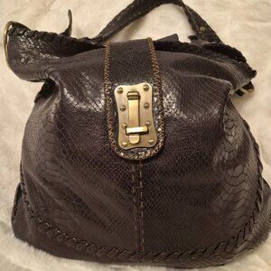 CARLA MANCiNi Plum Leather Snakeskin Pattern Hobo Bag with turn lock closure.